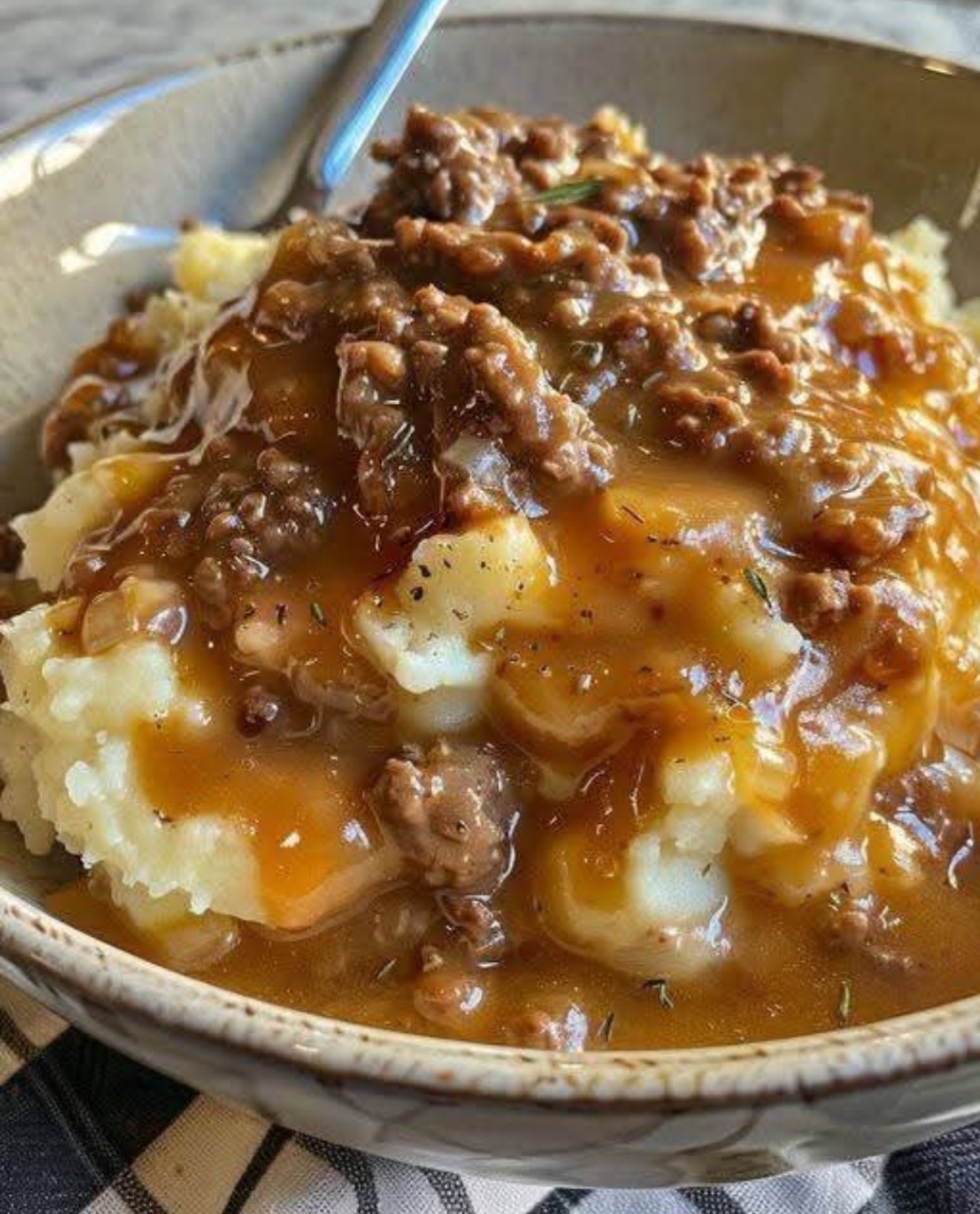 Creamy Mashed Potatoes with Savory Beef Gravy
